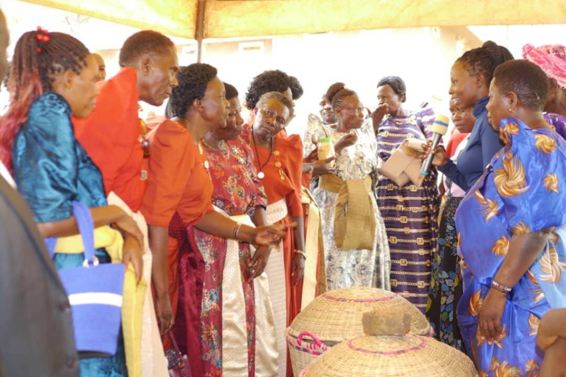 Women display their skills in cooking, crafting, and preparing local dishes, highlighting their contributions to the community Image
